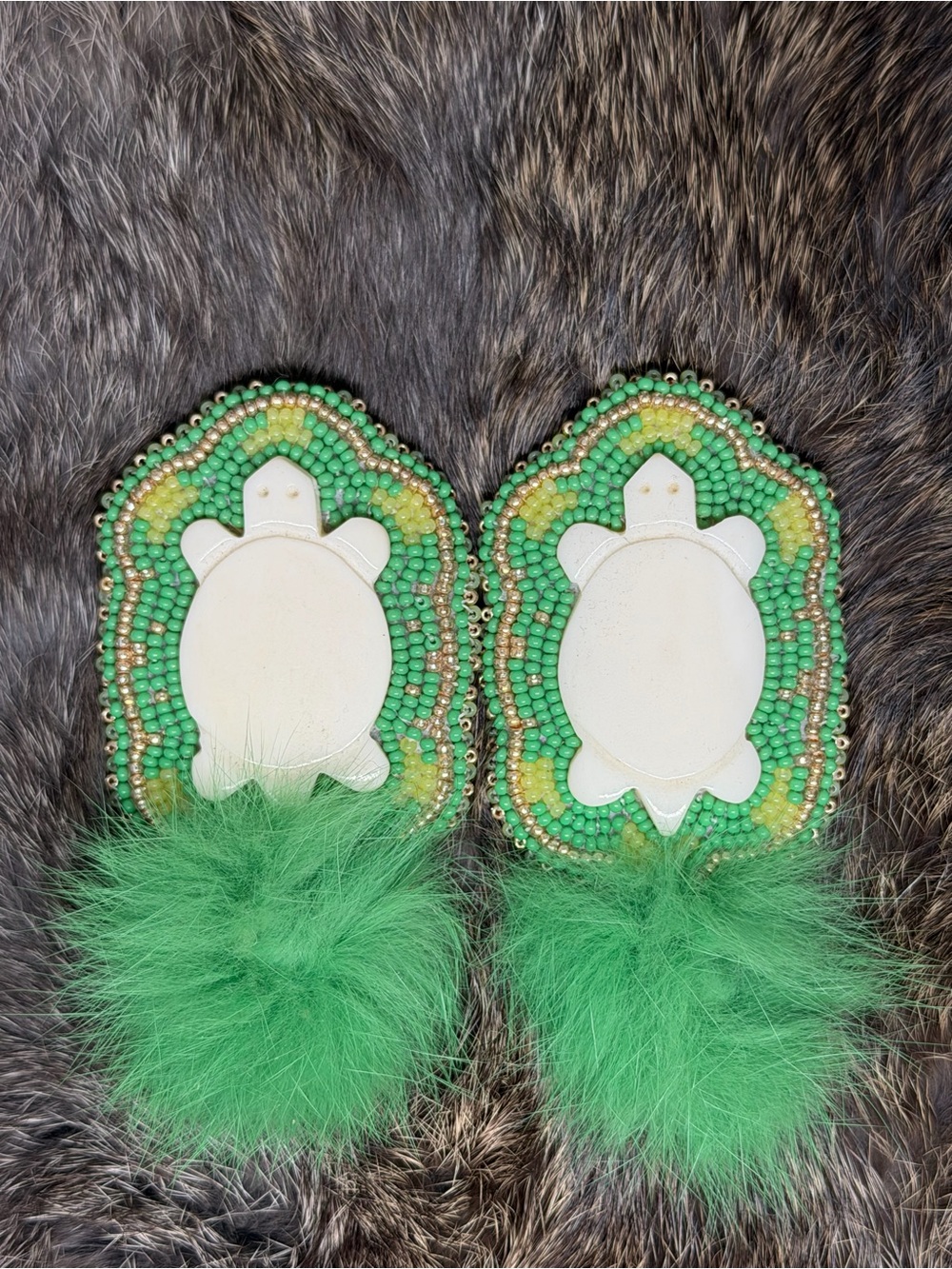 Green Beaded turtle earrings with fur Pompom Accent